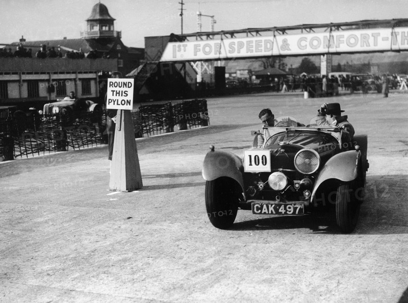 1938 S.S. 100 at Brooklands suring Junior Car Club event 25th March 1939 Artist: Unknown.