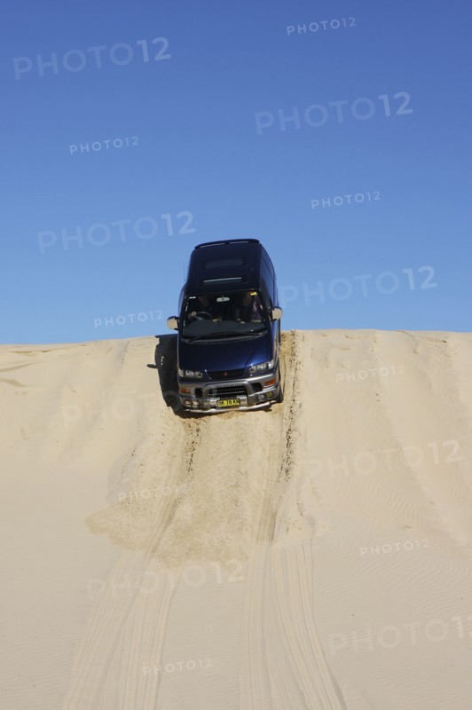 Mitsubishi Delica Space Gear V6 1996 in sand dunes New South Wales Australia Artist: Unknown.