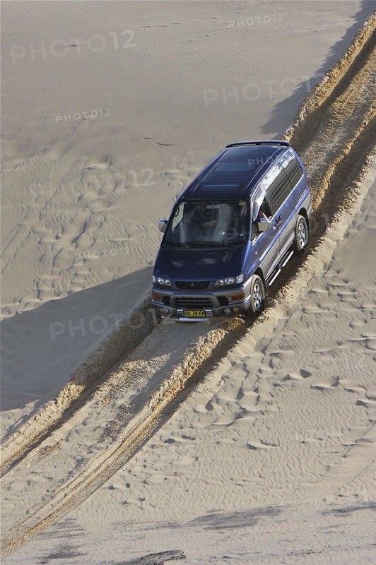Mitsubishi Delica Space Gear V6 1996 in sand dunes New South Wales Australia Artist: Unknown.