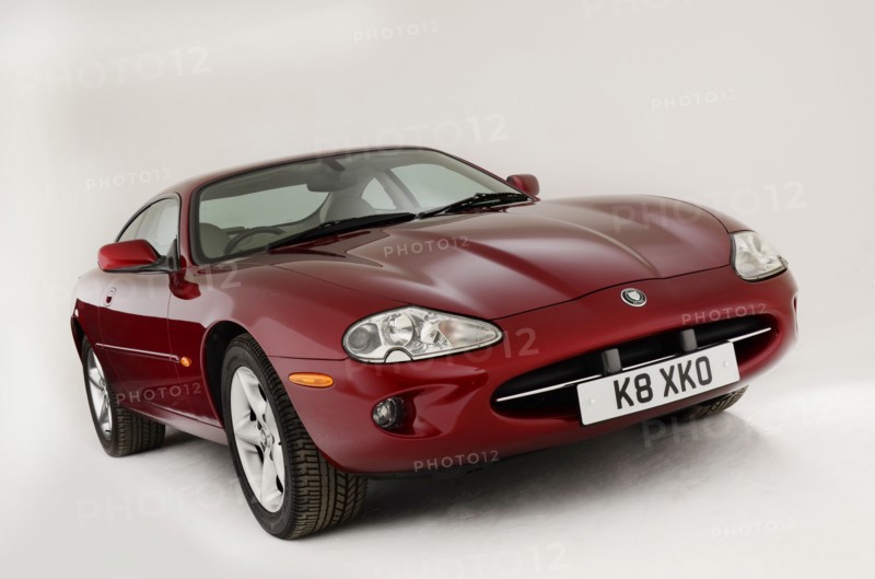 1999 Jaguar XK8 coupe Artist: Unknown.