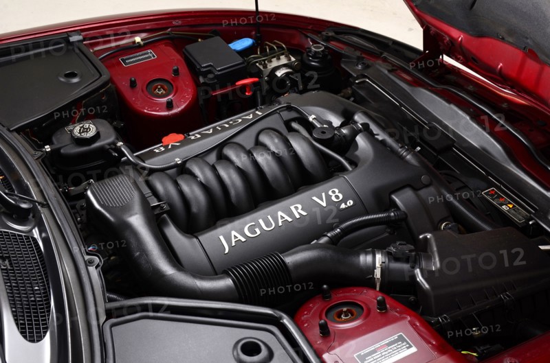 1999 Jaguar XK8 coupe Artist: Unknown.
