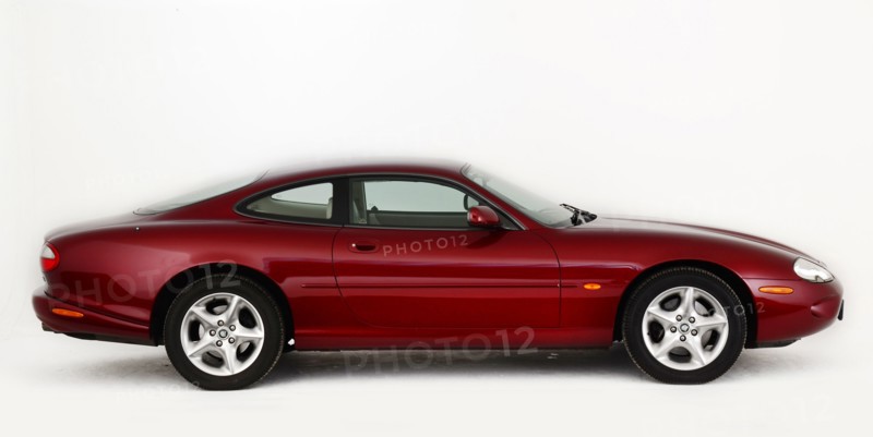 1999 Jaguar XK8 coupe Artist: Unknown.