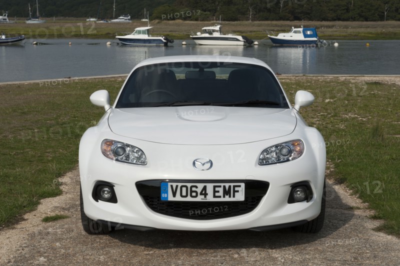2014 Mazda MX5 Roadster Coupe Artist: Unknown.