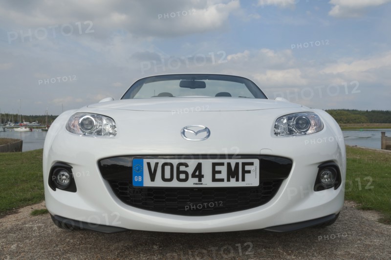 2014 Mazda MX5 Roadster Coupe Artist: Unknown.