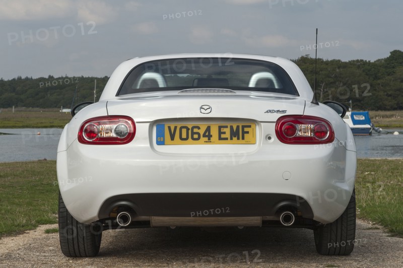 2014 Mazda MX5 Roadster Coupe Artist: Unknown.