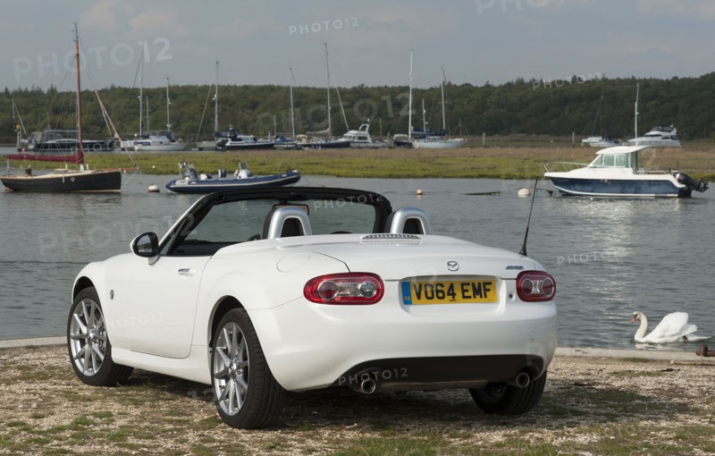 2014 Mazda MX5 Roadster Coupe Artist: Unknown.