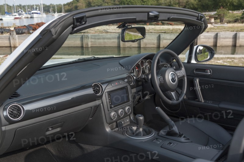 2014 Mazda MX5 Roadster Coupe Artist: Unknown.