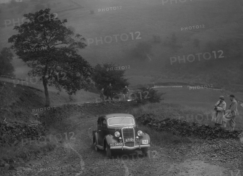 Ford V8 saloon of WS Millar competing in the MCC Sporting Trial, 1935. Artist: Bill Brunell.