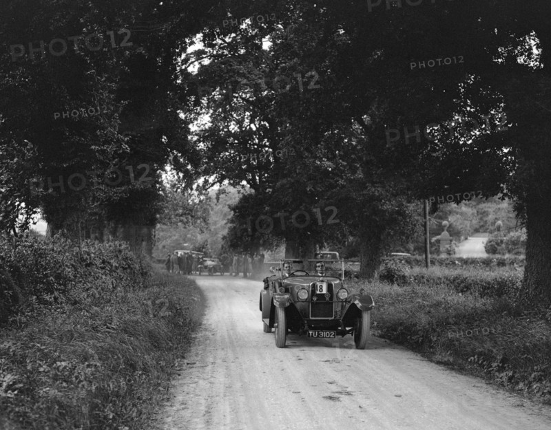 Talbot 18/55 4-seater tourer competing in the JCC Inter-Centre Rally, 1932. Artist: Bill Brunell.