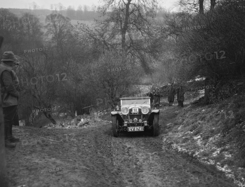 Alvis Silver Eagle of EW Bass competing in the Sunbac Colmore Trial, Gloucestershire, 1933. Artist: Bill Brunell.