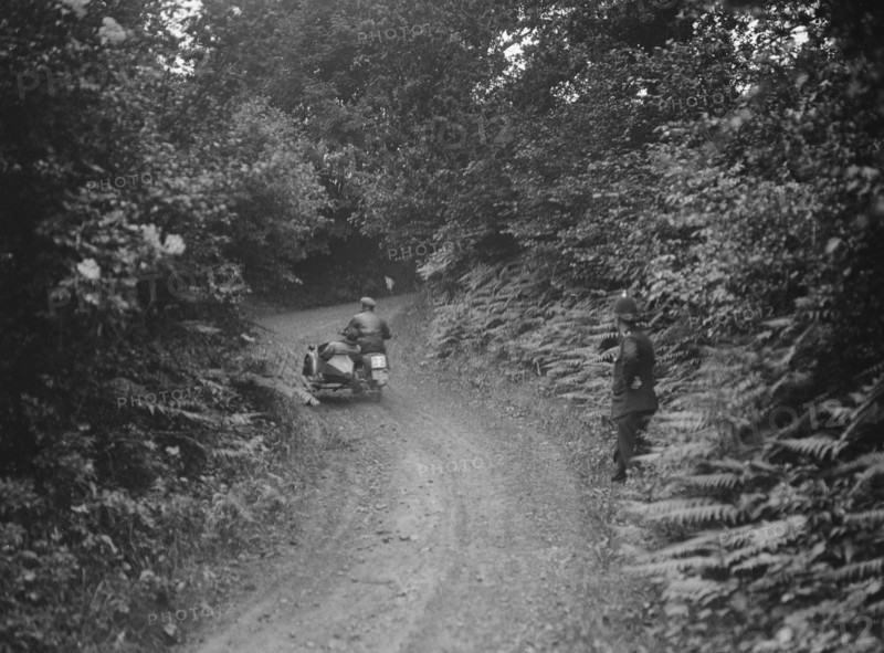 Motorcycle and sidecar, B&HMC Brighton-Beer Trial, Simms Hill, Ilsington, Devon, 1930. Artist: Bill Brunell.