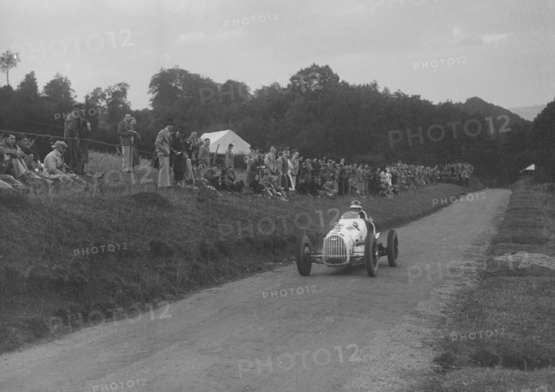 Austin 7 of LP Driscoll competing in the MAC Shelsley Walsh Speed Hill Climb, Worcestershire, 1935. Artist: Bill Brunell.