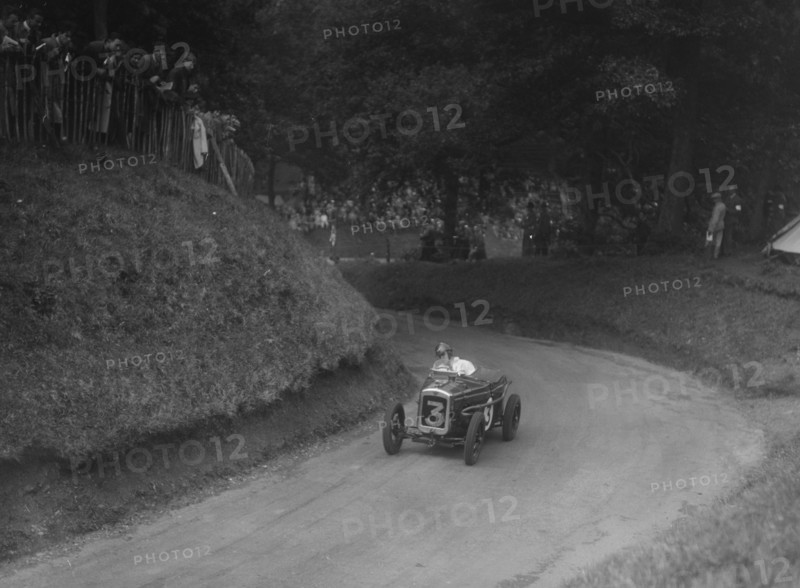 Austin Ulster TT type competing in the MAC Shelsley Walsh Speed Hill Climb, Worcestershire, 1935. Artist: Bill Brunell.