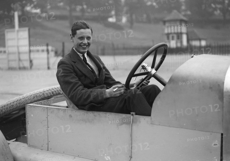 Bertie Kensington Moir in an Aston Martin crude test body, Brooklands, c1921. Artist: Bill Brunell.