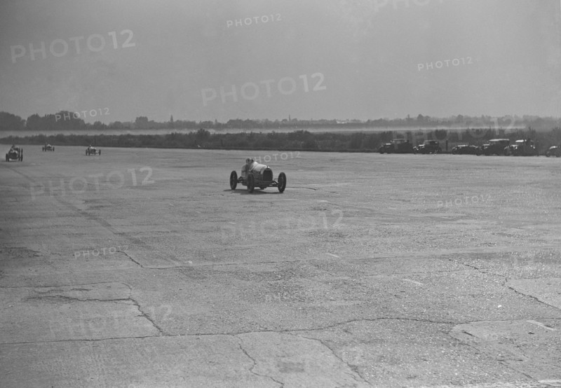 Delage racing at a Surbiton Motor Club race meeting, Brooklands, Surrey, 1928. Artist: Bill Brunell.