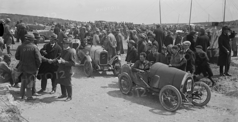 Raymond Mays' Bugatti Brescia and JS Chance's Enfield Allday, Porthcawl Speed Trials, Wales, 1922. Artist: Bill Brunell.