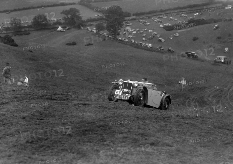 MG PA of the Cream Cracker team competing in the MG Car Club Rushmere Hillclimb, Shropshire, 1935. Artist: Bill Brunell.