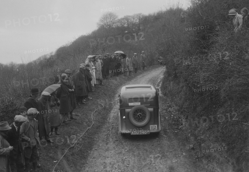 Standard saloon of AG Jones competing in the MCC Lands End Trial, 1935. Artist: Bill Brunell.