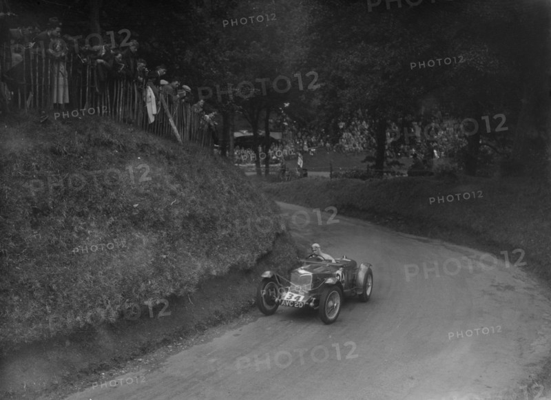 Riley TT Sprite competing in the Shelsley Walsh Hillclimb, Worcestershire, 1935. Artist: Bill Brunell.