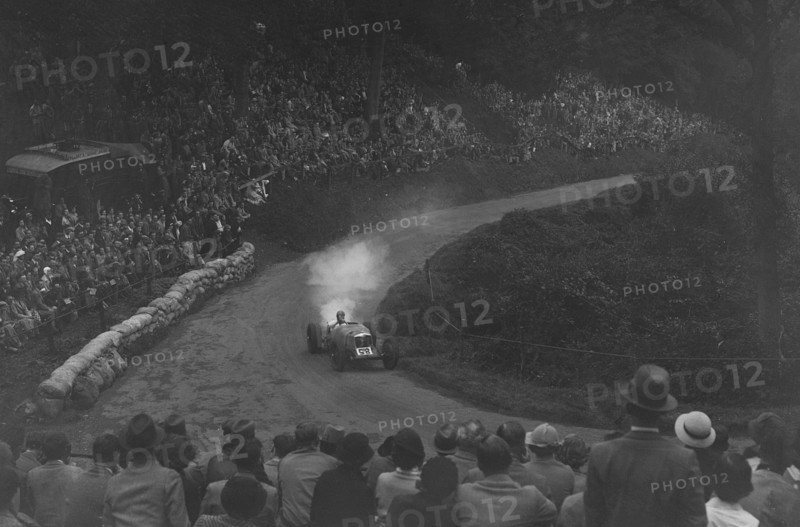 Riley Racing Six of Freddie Dixon competing in the Shelsley Walsh Hillclimb, Worcestershire, 1935. Artist: Bill Brunell.
