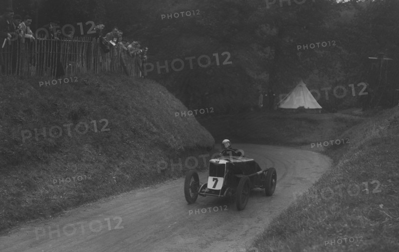 MG C type of Barbara Skinner competing in the Shelsley Walsh Hillclimb, Worcestershire, 1935. Artist: Bill Brunell.