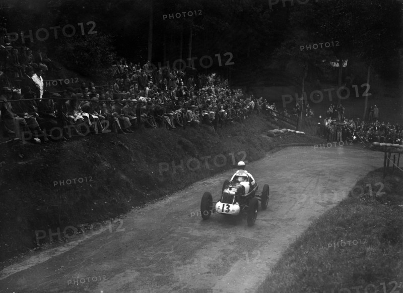 Single-seater MG R type competing in the Shelsley Walsh Hillclimb, Worcestershire, 1935. Artist: Bill Brunell.