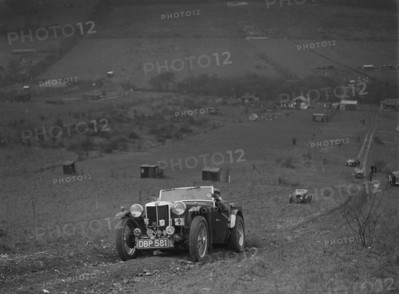 MG TA competing in the London Motor Club Coventry Cup Trial, Knatts Hill, Kent, 1938. Artist: Bill Brunell.