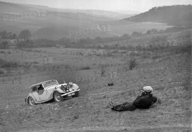 Riley 16 competing in the London Motor Club Coventry Cup Trial, Knatts Hill, Kent, 1938. Artist: Bill Brunell.