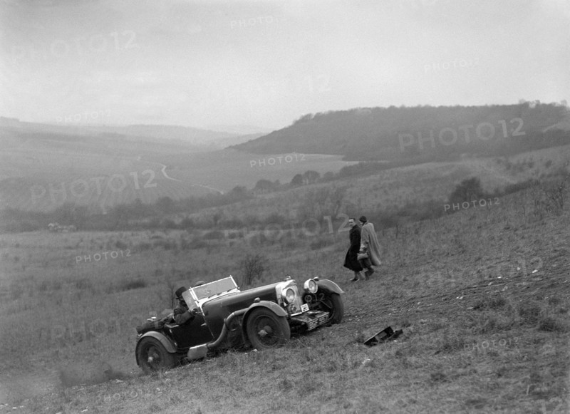 Aston Martin competing in the London Motor Club Coventry Cup Trial, Knatts Hill, Kent, 1938. Artist: Bill Brunell.