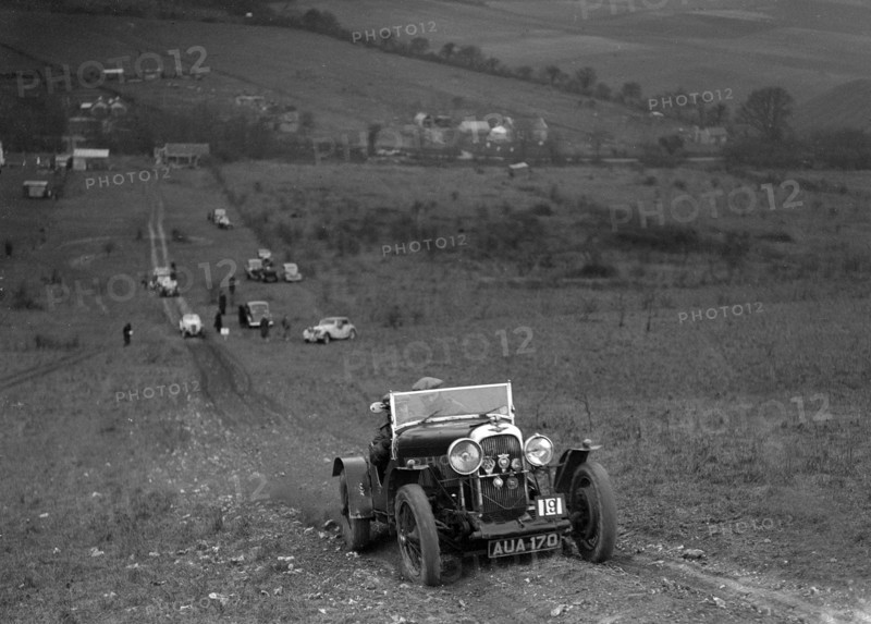 Lagonda Rapier competing in the London Motor Club Coventry Cup Trial, Knatts Hill, Kent, 1938. Artist: Bill Brunell.