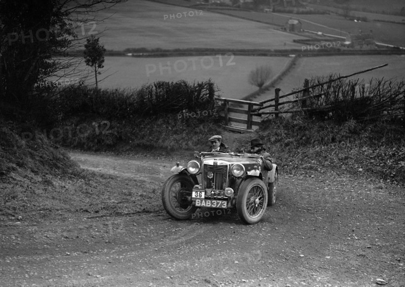 MG TA of NH Grove competing in the MG Car Club Midland Centre Trial, 1938. Artist: Bill Brunell.
