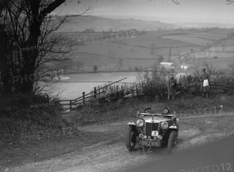 MG TA of JL Lutwyche competing in the MG Car Club Midland Centre Trial, 1938. Artist: Bill Brunell.