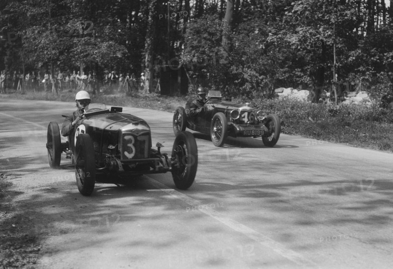 Two Riley Brooklands racing at Donington Park, Leicestershire, 1930s. Artist: Bill Brunell.