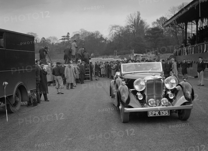 Lagonda open 4-seater tourer, possibly owned by Earl Howe, Crystal Palace, London, 1939. Artist: Bill Brunell.
