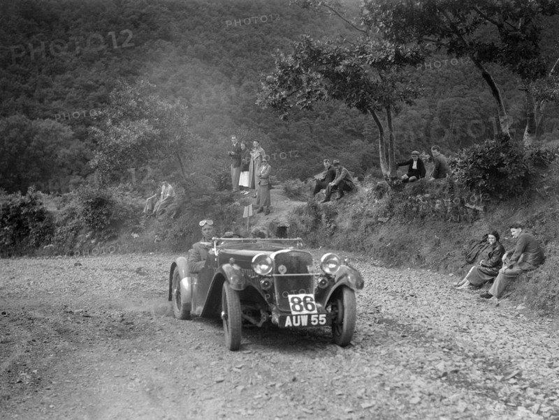 Singer sports 2-seater at the Mid Surrey AC Barnstaple Trial, Beggars Roost, Devon, 1934. Artist: Bill Brunell.