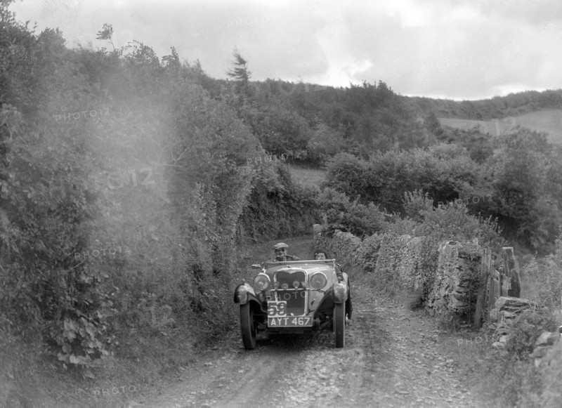 Singer open sports competing in the Mid Surrey AC Barnstaple Trial, 1934. Artist: Bill Brunell.