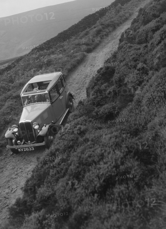 Kitty Brunell road testing a Standard Little Twelve saloon, c1932. Artist: Bill Brunell.