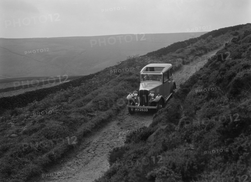 Kitty Brunell road testing a Standard Little Twelve saloon, c1932. Artist: Bill Brunell.