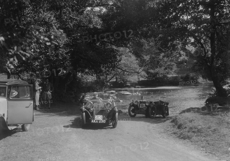Singer Le Mans and MG D type at the Mid Surrey AC Barnstaple Trial, Tarr Steps, Exmoor, 1934. Artist: Bill Brunell.