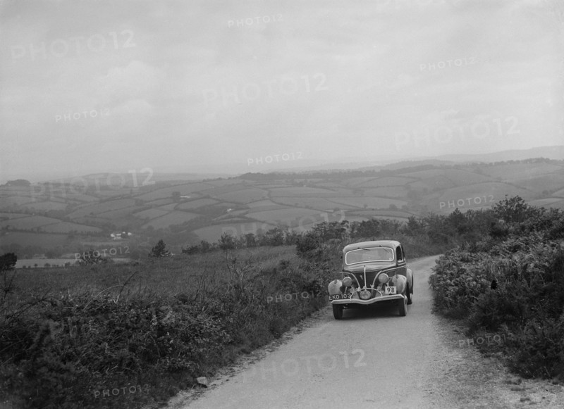 Ford V8 competing in the MCC Torquay Rally, 1938. Artist: Bill Brunell.
