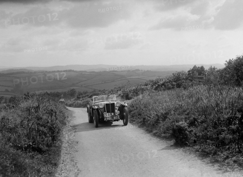MG TA of JES Jones of the Cream Cracker Team competing in the MCC Torquay Rally, 1938. Artist: Bill Brunell.