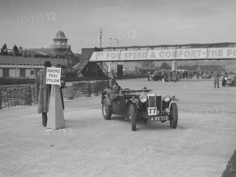 MG TA competing in the JCC Rally, Brooklands, Surrey, 1939. Artist: Bill Brunell.