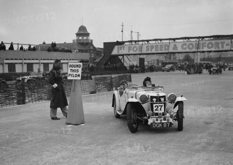 MG sports competing in the JCC Rally, Brooklands, Surrey, 1939. Artist: Bill Brunell.