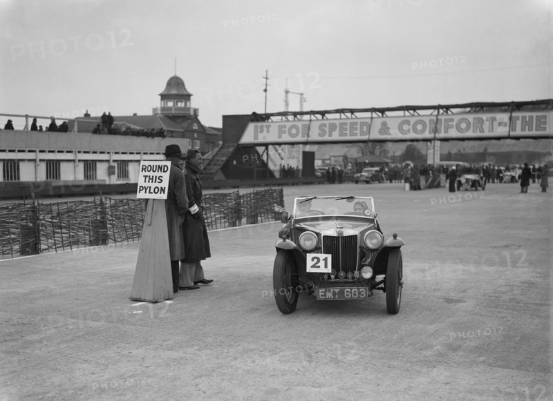 MG TA competing in the JCC Rally, Brooklands, Surrey, 1939. Artist: Bill Brunell.