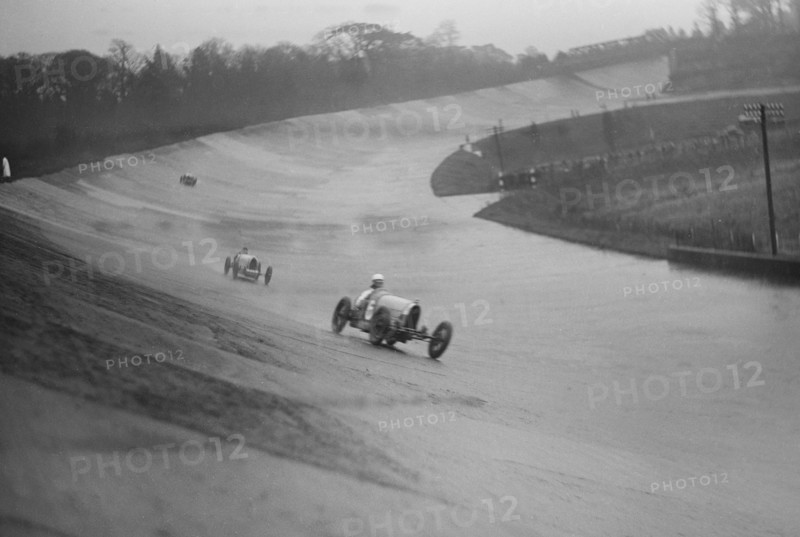 Two Bugattis racing at a BARC meeting, Brooklands, Surrey, 1931 Artist: Bill Brunell.