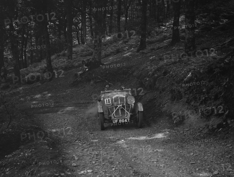 Wolseley Hornet of ARC Rigby taking part in a motoring trial, c1930s. Artist: Bill Brunell.