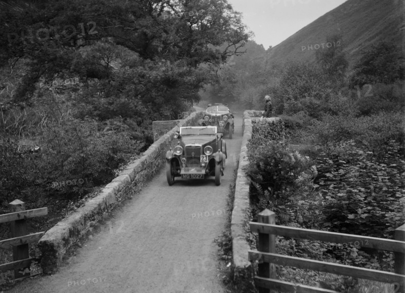 MG M type crossing Figle Bridge during a motoring trial, Devon, c1930s. Artist: Bill Brunell.
