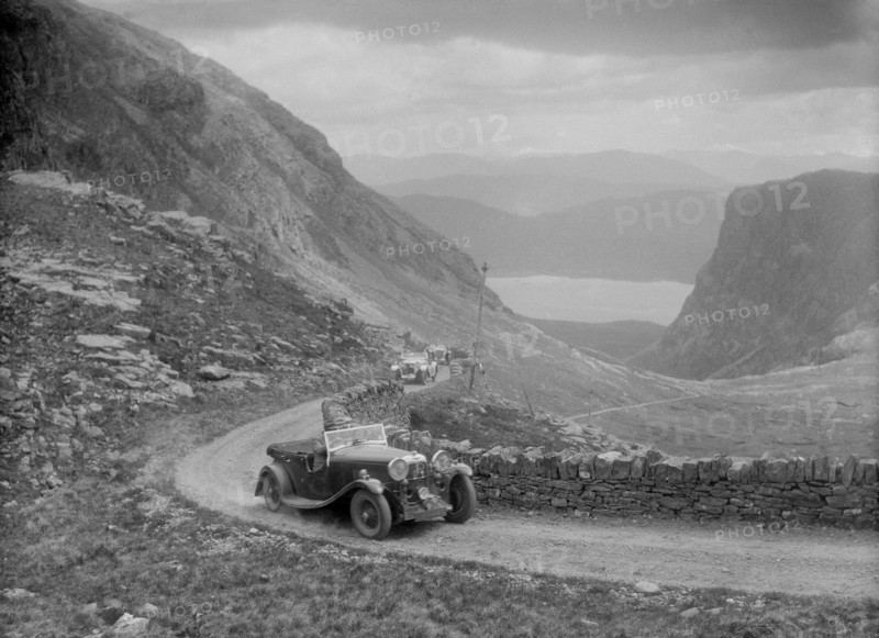 Lagonda competing in the RSAC Scottish Rally, 1936. Artist: Bill Brunell.