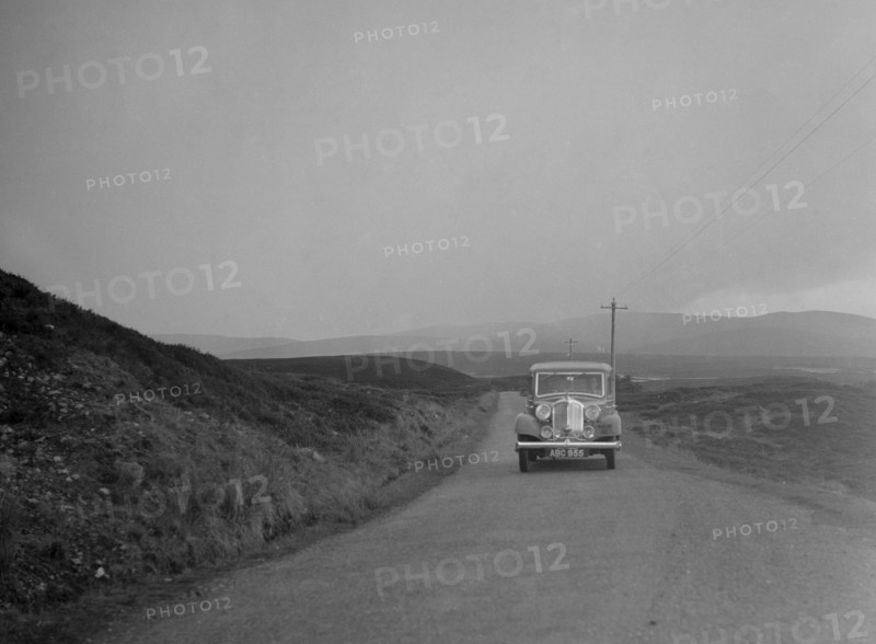 Rover of SJ Clutterbuck competing in the RSAC Scottish Rally, 1936. Artist: Bill Brunell.