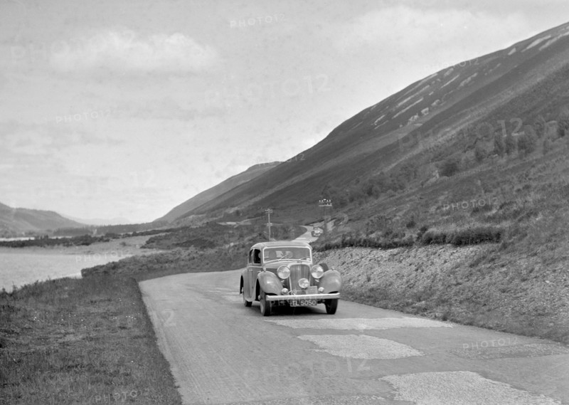 SS Jaguar of CL Bembridge competing in the RSAC Scottish Rally, 1936. Artist: Bill Brunell.